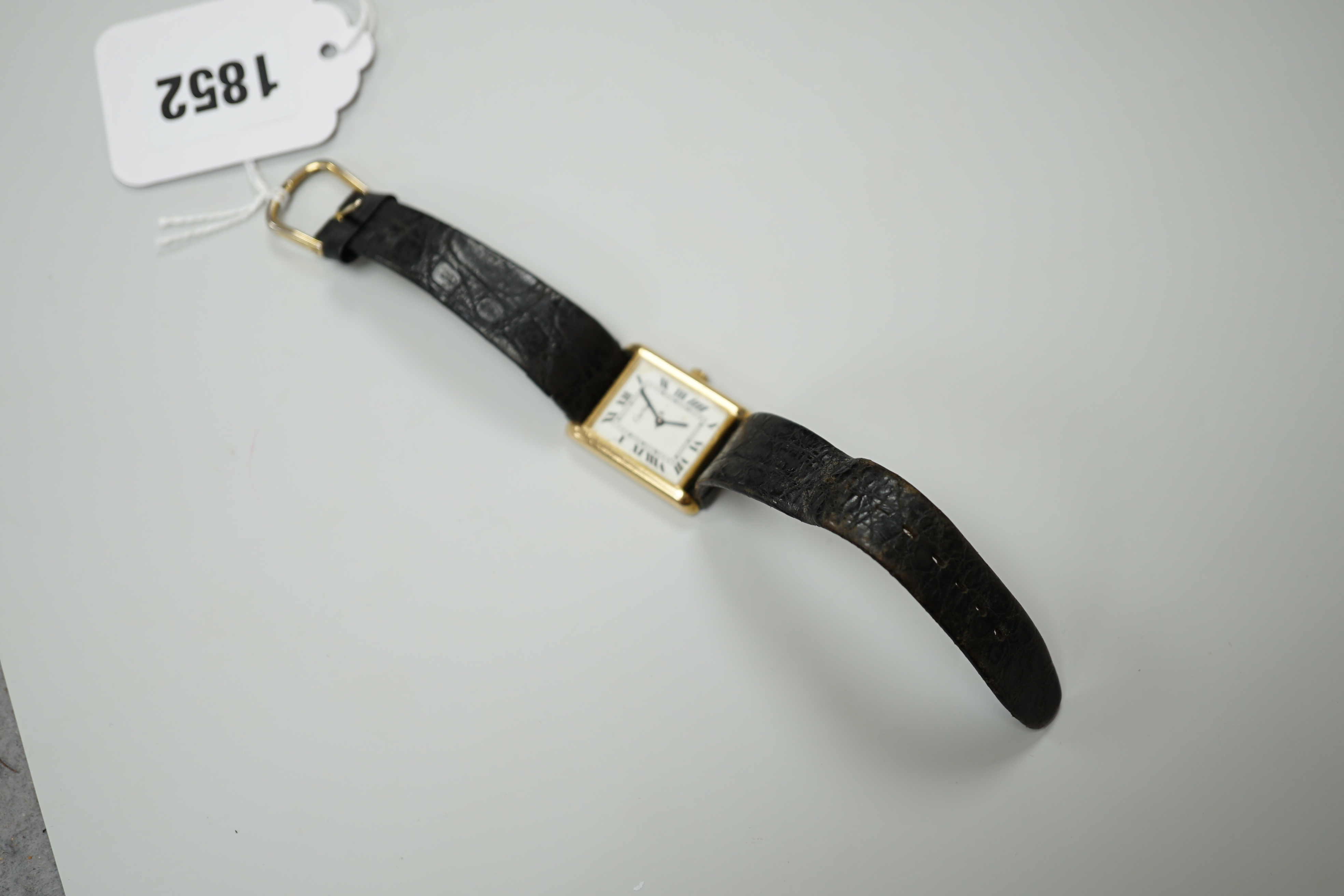 A lady's gold plated Cartier Tank wrist watch, with quartz movement, 2.5cm